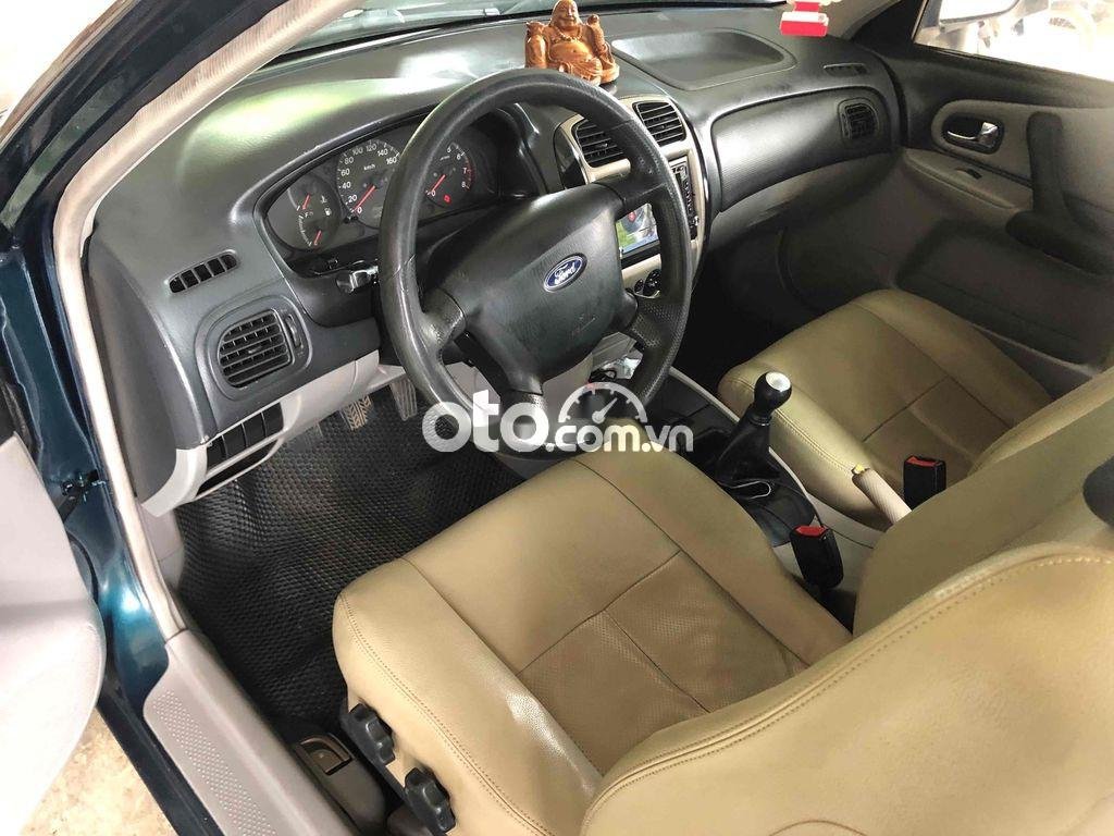 Ford Laser cần bán xe   bản deluxe, xe đẹp, chạy phe 2001 - cần bán xe ford laser bản deluxe, xe đẹp, chạy phe