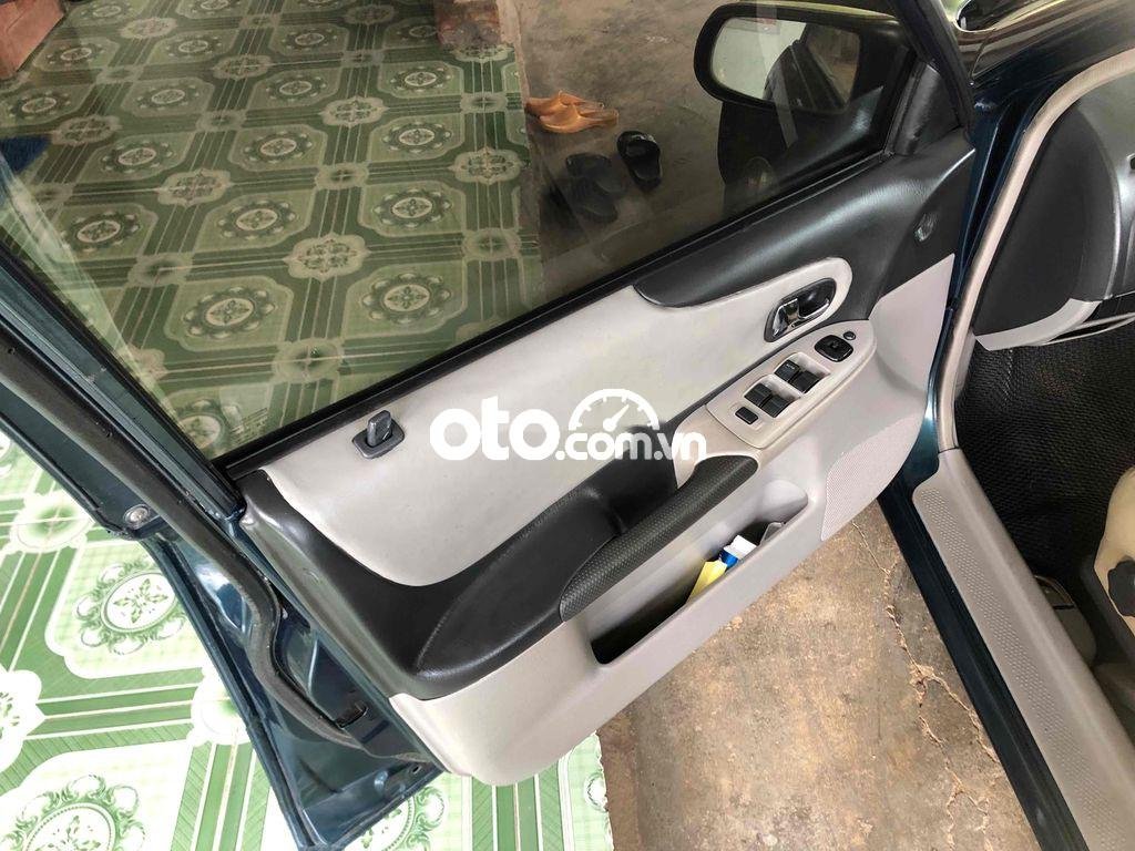 Ford Laser cần bán xe   bản deluxe, xe đẹp, chạy phe 2001 - cần bán xe ford laser bản deluxe, xe đẹp, chạy phe
