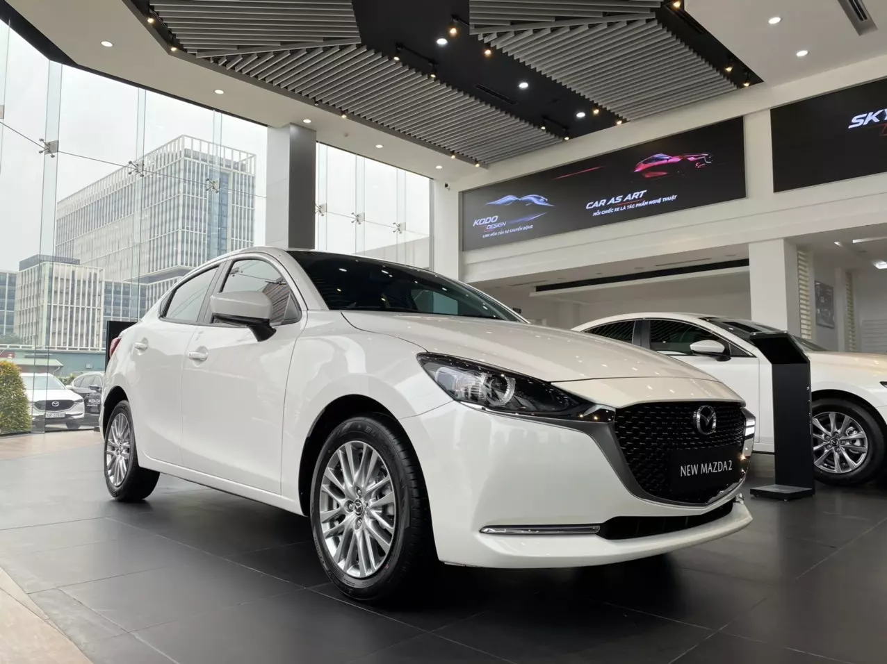 Mazda Maxda 2 AT 2023 - Sẵn xe giao ngay - Mazda Maxda 2 AT đời 2023, màu trắng, nhập khẩu nguyên chiếc 