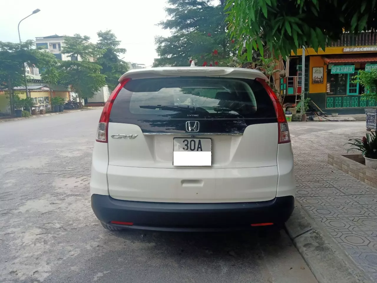 Honda CR V 2.4G 2014 - Gia đình cần bán chiếc xe ô tô Honda CR-V 2.4G màu Trắng SX 2014