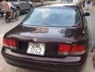 Mazda 626 MT 1994 - Tôi bán ô tô Mazda 626 MT sản xuất 1994, màu nâu số sàn
