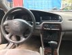 Nissan Altima G 1998 - Cần bán gấp Nissan Altima G đời 1998, màu đen, nhập khẩu nguyên chiếc số tự động giá cạnh tranh
