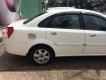 Daewoo Lacetti 2002 - Cần bán gấp Daewoo Lacetti đời 2002 màu trắng, giá 222 triệu