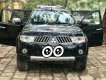 Mitsubishi Pajero  Sport 2.5 MT 2011 - Cần bán Mitsubishi Pajero Sport 2.5 MT đời 2011, màu đen xe gia đình, giá 640tr