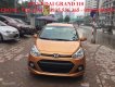 Hyundai Grand i10 2017 - Bán xe Hyundai Grand i10 năm 2017, màu vàng, xe nhập
