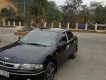 Mazda 323F   1999 - Cần bán gấp Mazda 323F đời 1999, màu đen, nhập khẩu