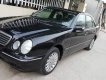 Mercedes-Benz E240 2002 - Cần bán Mercedes-Benz E240 đăng ký 2002, màu đen ít sử dụng, 207tr