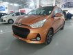 Hyundai Grand i10 2018 - Bán xe Hyundai Grand i10 sx 2018 màu cam bản đủ, giá tốt nhất. LH 090.467.5566