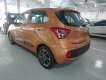 Hyundai Grand i10 2018 - Bán xe Hyundai Grand i10 sx 2018 màu cam bản đủ, giá tốt nhất. LH 090.467.5566