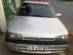 Mazda 323   1995 - Bán xe cũ Mazda 323 đời 1995, màu bạc xe gia đình