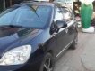 Kia Carens   2009 - Bán xe cũ Kia Carens 2009, màu đen xe gia đình