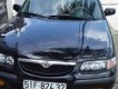 Mazda 626   MT 1999 - Bán xe Mazda 626 MT 1999, màu đen, 175tr