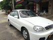 Daewoo Lanos LX 2004 - Cần bán Daewoo Lanos LX đời 2004, màu trắng xe gia đình