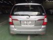 Toyota Innova E 2014 - Cần bán Toyota Innova E đời 2014, màu bạc số sàn, giá 670tr