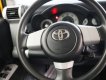 Toyota Fj cruiser   4.0 AT  2007 - Cần bán xe Toyota FJ Cruiser, Sx 2007, màu vàng, nội thất đen, ghế bọc nỉ
