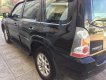 Mazda Tribute 2009 - Cần bán lại xe Mazda Tribute 2009, màu đen, nhập khẩu nguyên chiếc số tự động