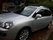 Kia Carens 2013 - Cần bán gấp Kia Carens năm 2013, màu bạc mới 95%, giá chỉ 525 triệu