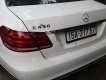 Mercedes-Benz E400  AMG 2014 - Cần bán gấp Mercedes AMG đời 2014, màu trắng