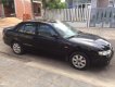 Mazda 626 2001 - Cần bán lại xe Mazda 626 đời 2001, màu đen, nhập khẩu chính chủ