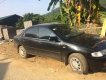 Mazda 323   1998 - Cần bán xe cũ Mazda 323 đời 1998, màu đen