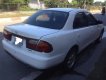 Mazda 323F 1999 - Cần bán xe Mazda 323F đời 1999, màu trắng, nhập khẩu nguyên chiếc chính chủ