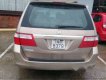 Honda Odyssey 2006 - Cần bán Honda Odyssey sản xuất 2006, màu ghi vàng  