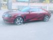 Hyundai Tuscani 2.0MT 2005 - Cần bán Hyundai Tuscani 2.0MT năm 2005, màu đỏ, xe nhập xe gia đình giá cạnh tranh