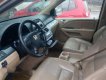 Honda Odyssey 2006 - Cần bán Honda Odyssey sản xuất 2006, màu ghi vàng  