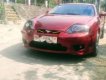 Hyundai Tuscani 2.0MT 2005 - Cần bán Hyundai Tuscani 2.0MT năm 2005, màu đỏ, xe nhập xe gia đình giá cạnh tranh
