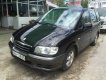 Hyundai Trajet 2004 - Cần bán gấp Hyundai Trajet 2004, màu đen số tự động, giá chỉ 320 triệu