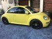 Volkswagen Beetle MT 2005 - Cần bán Volkswagen Beetle MT đời 2005, màu vàng số sàn giá cạnh tranh