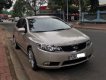 Kia Forte SX 2010 - Cần bán lại xe Kia Forte SX đời 2010, màu vàng