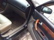 Daewoo Magnus 2.0 MT 2004 - Bán Daewoo Magnus 2.0 MT đời 2004, màu đen như mới, 178 triệu