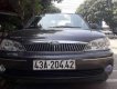 Ford Laser  Ghina 1.8 2002 - Bán Ford Laser Ghina 1.8 đời 2002, màu đen