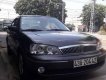 Ford Laser  Ghina 1.8 2002 - Bán Ford Laser Ghina 1.8 đời 2002, màu đen