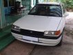 Mazda 323 1995 - Cần bán lại xe Mazda 323 đời 1995, màu trắng, xe nhập, giá 72tr