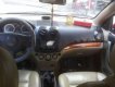 Daewoo Gentra SX 2006 - Cần bán lại xe Daewoo Gentra SX 2006, màu đỏ số sàn