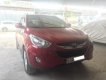 Hyundai Tucson 4WD 2010 - Bán ô tô Hyundai Tucson 4WD năm 2010, màu đỏ, nhập khẩu, biển TP, giá thương lượng