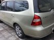 Nissan Grand livina  MT 2011 - Cần bán gấp Nissan Livina 2011, màu vàng cát, còn mới