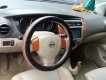 Nissan Grand livina  MT 2011 - Cần bán gấp Nissan Livina 2011, màu vàng cát, còn mới