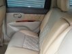 Nissan Grand livina  MT 2011 - Cần bán gấp Nissan Livina 2011, màu vàng cát, còn mới