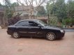 Kia Spectra 1.6 MT 2004 - Bán Kia Spectra 1.6 MT năm 2004, màu đen