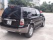 Ford Escape XLT 3.0 AT 2006 - Gia đình bán xe Ford Escape XLT 3.0 AT 2006, màu đen  