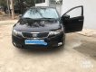 Kia Forte 2011 - Bán ô tô Kia Forte đời 2011, màu đen, giá 390tr