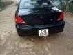 Kia Spectra 1.6 MT 2005 - Cần bán xe Kia Spectra 1.6 MT đời 2005, màu đen số sàn