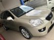 Kia Carens SX 2012 - Bán Kia Carens SX đời 2012, màu vàng