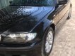 BMW 3 Series 318i  2004 - Bán ô tô BMW 318i năm 2004, màu đen, nhập khẩu nguyên chiếc