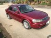 Ford Laser 2003 - Cần bán gấp Ford Laser đời 2003, màu đỏ