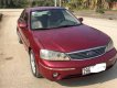 Ford Laser Ghia 1.8 MT 2003 - Cần bán lại xe Ford Laser Ghia 1.8 MT sản xuất 2003, màu đỏ