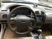 Ford Laser 1.8AT 2004 - Cần bán gấp Ford Laser 1.8AT đời 2004, màu đen, 250tr
